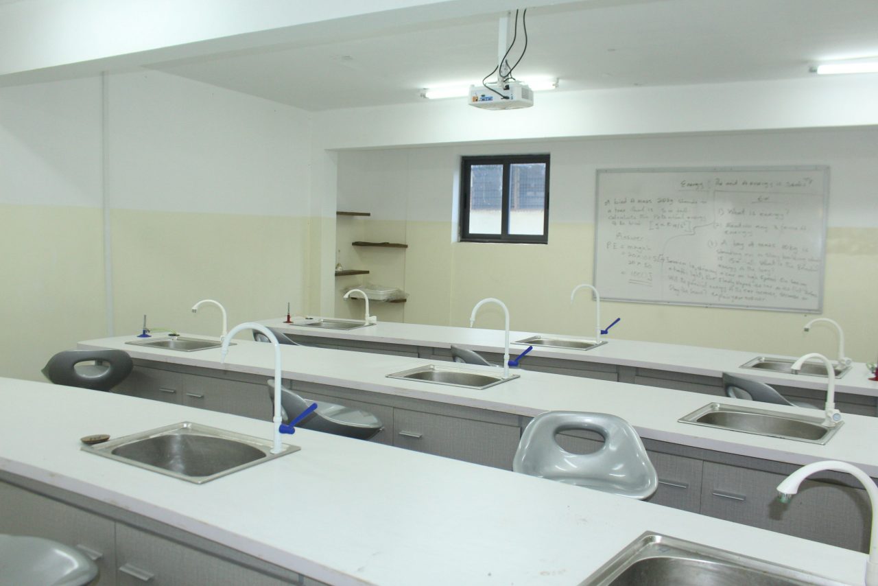 Junior High science laboratory with an Energy lesson on the board